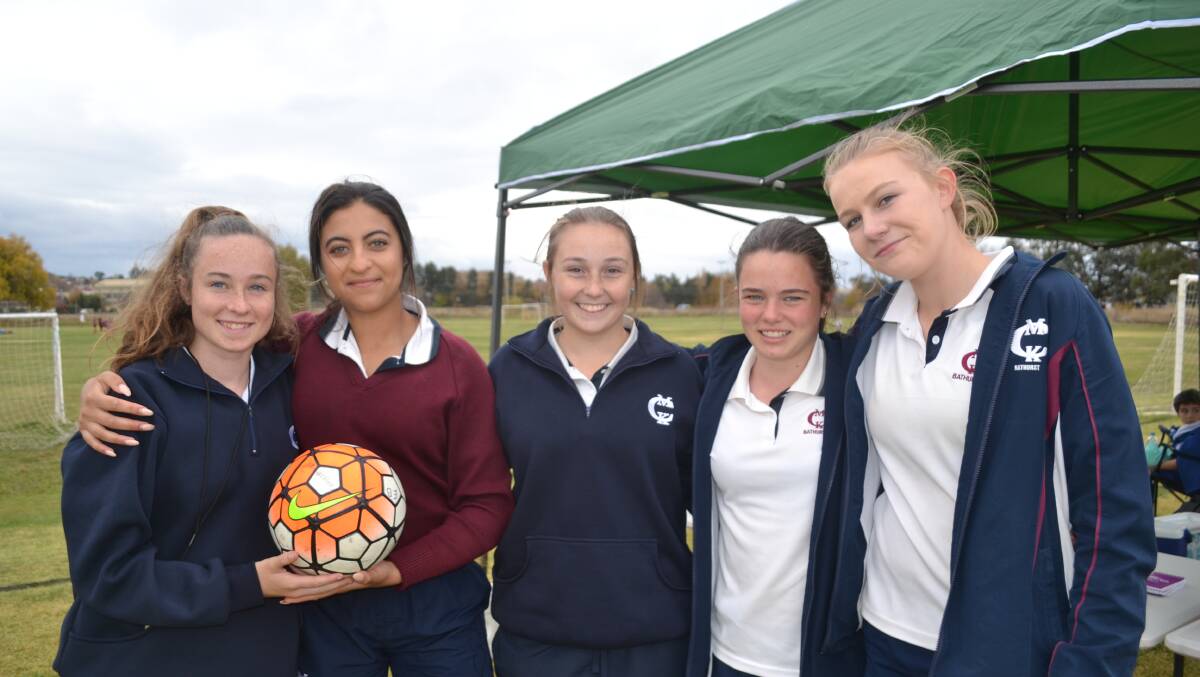 HELPING OUT: MacKillop  College students Claudia Coker, Sara Faraj, Chloe Johns, Emma Bromhead and Zoey Wade helped out umpiring on the day.