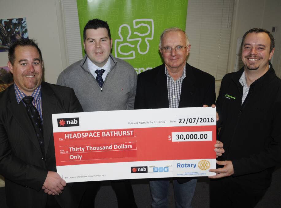 GREAT SUPPORT: Tim Brown and Matthew Rumble (NAB), Rotary Club of Bathurst Daybreak president Stephen Darlington and headspace operations manager Peter Rohr.