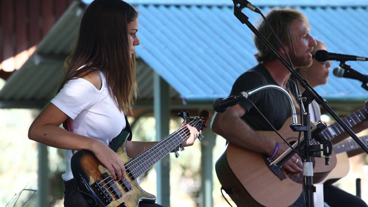 YOUNG TALENT: Isabelle Fulton, Mickey and Clancy Pye at the country music concert at Bicentennial Park on Saturday night.