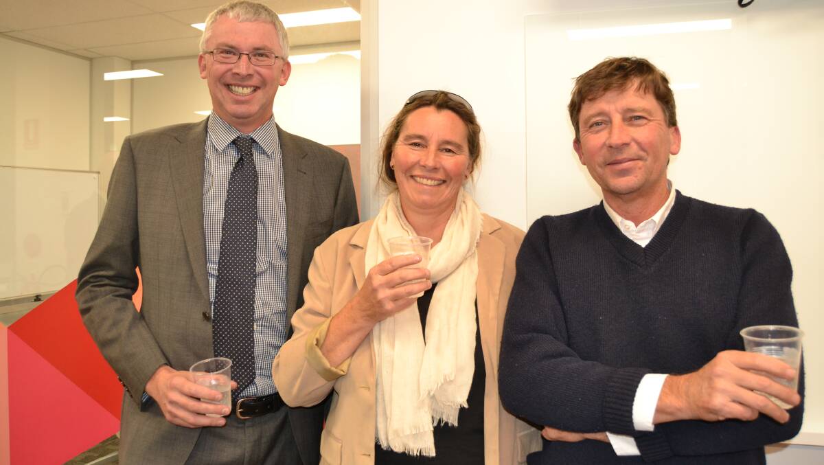NEW LOOK OFFICE: Solicitor, Angus Edwards, catching up with Xanthe and Christopher Morgan, at the official opening of the new Western Advocate office.
