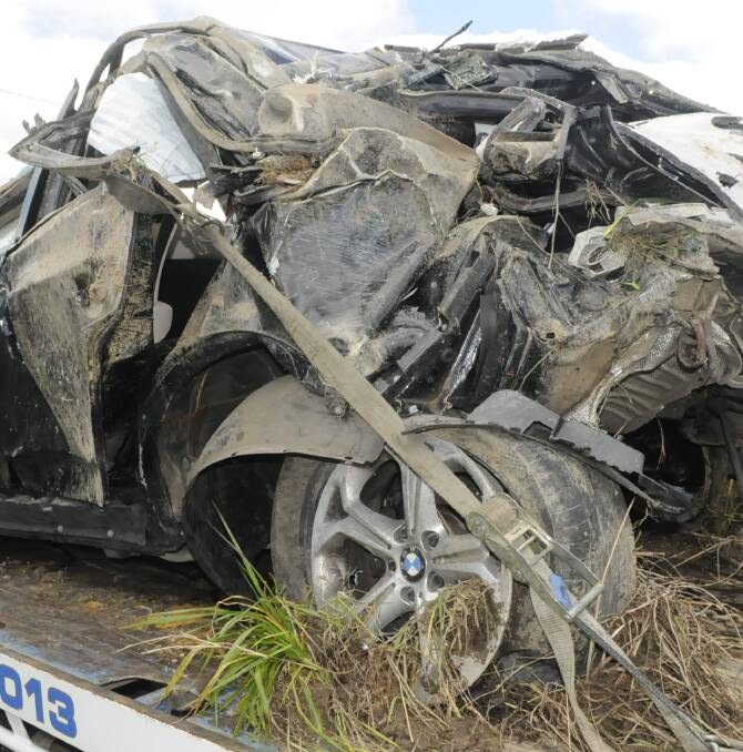 WHAT'S LEFT: A 23-year-old man is in a stable condition after his BMW rolled several times on the Mid Western Highway on Monday morning. Authorities said the driver was lucky to have survived the crash.