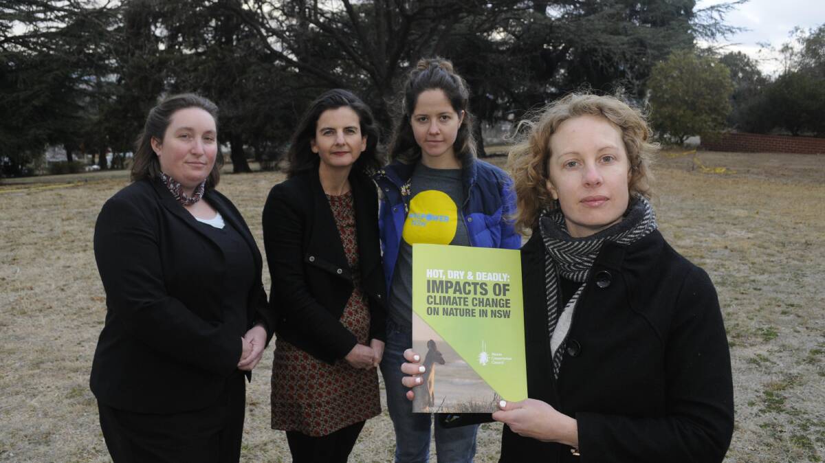 CLIMATE CHANGE: Left, Ellen Gerasghty (Executive Officer, Rahamin), Sally Neaves(BCCAN), Jacqui Mumford (Nature Conservation Council) with Daisy Barham, at Rahamin. Photo:CHRIS SEABROOK  071917climate