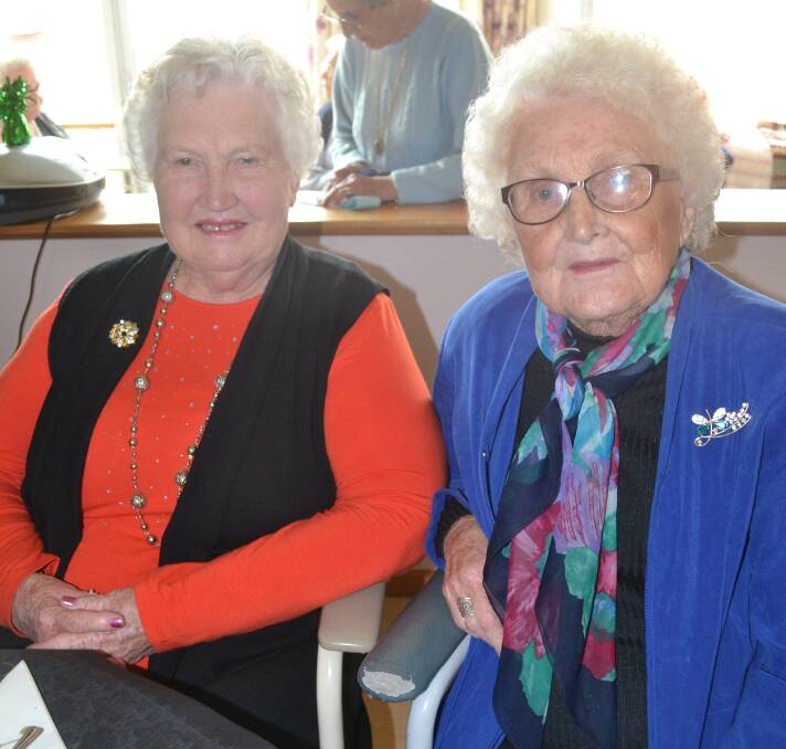 CATCHING UP: Mavis Inwood with Emily Foskett at the afternoon tea.