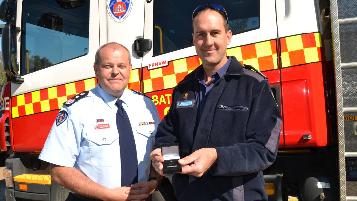 LONG SERVICE: Fire and Rescue NSW Commissioner, Paul Baxter, with long serving Bathurst firefighter, Anthony Baillie.