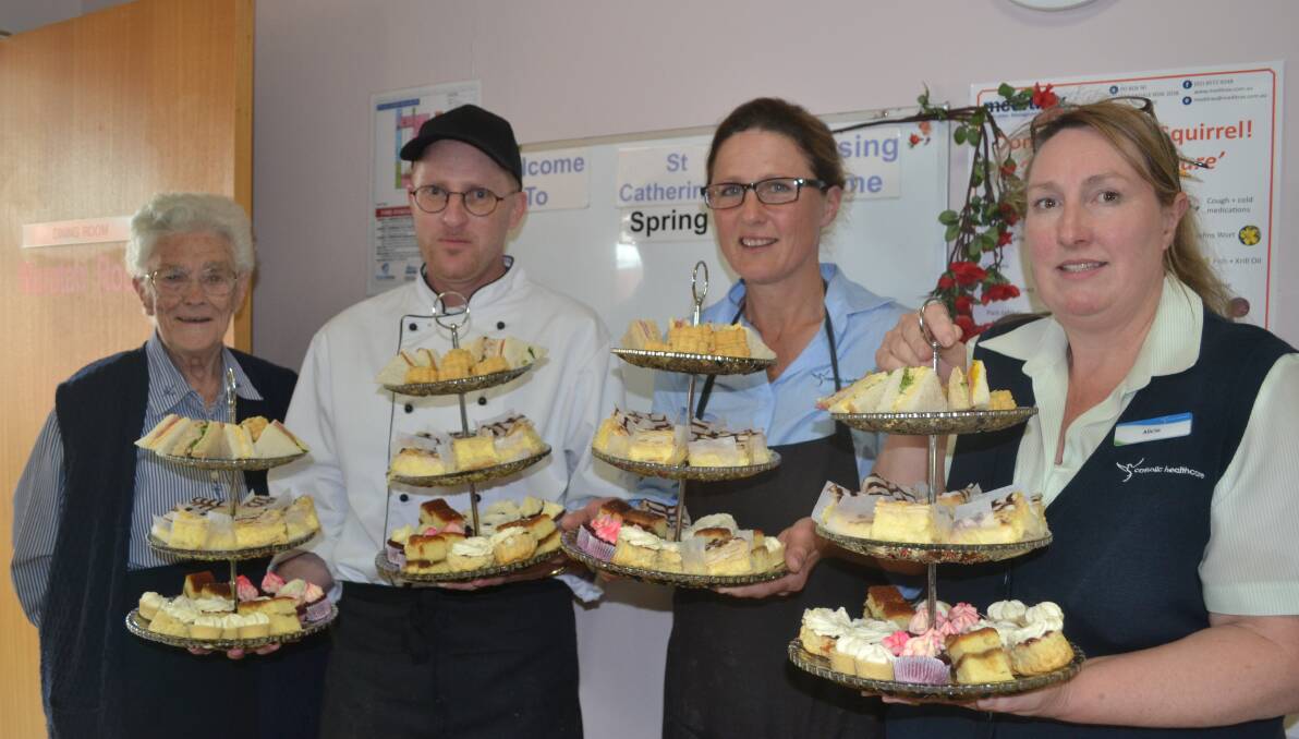 AFTERNOON TEA IS SERVED: Betty Burke, chef Renier Du Plessis, Vikki Blazley and Alicia Ellis, with some of the treats served at the high tea.