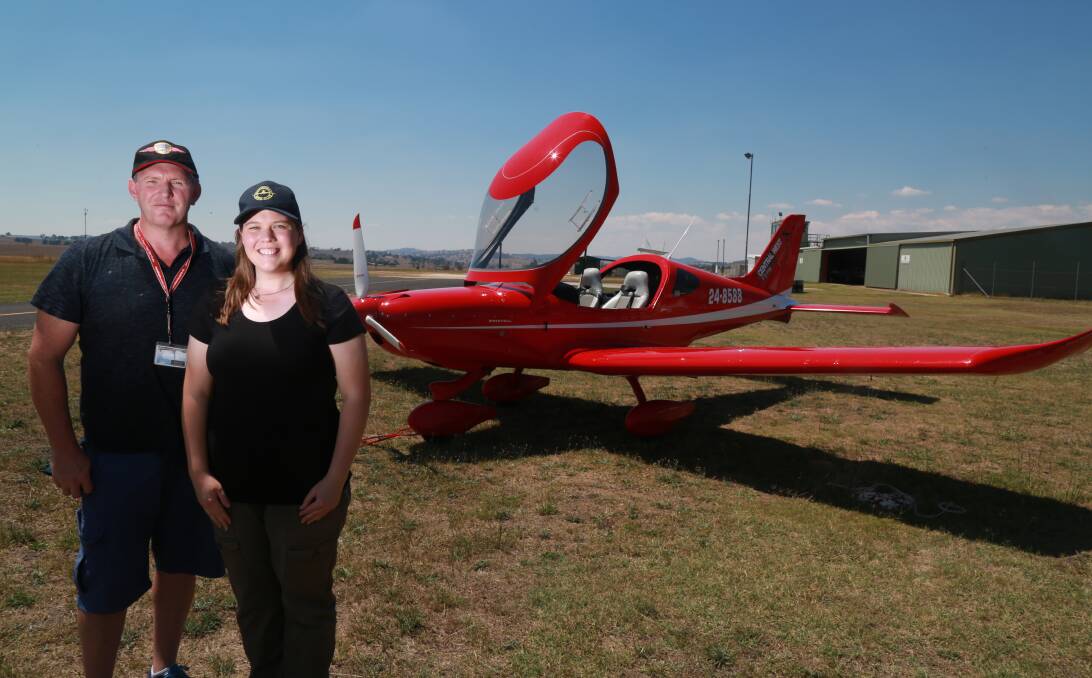 Instructor Dave Carroll and Bathurst Pilot of the Year Michelle O'Hare promoting the 'Women with Wings' event, being held at the Bathurst Airport in March.