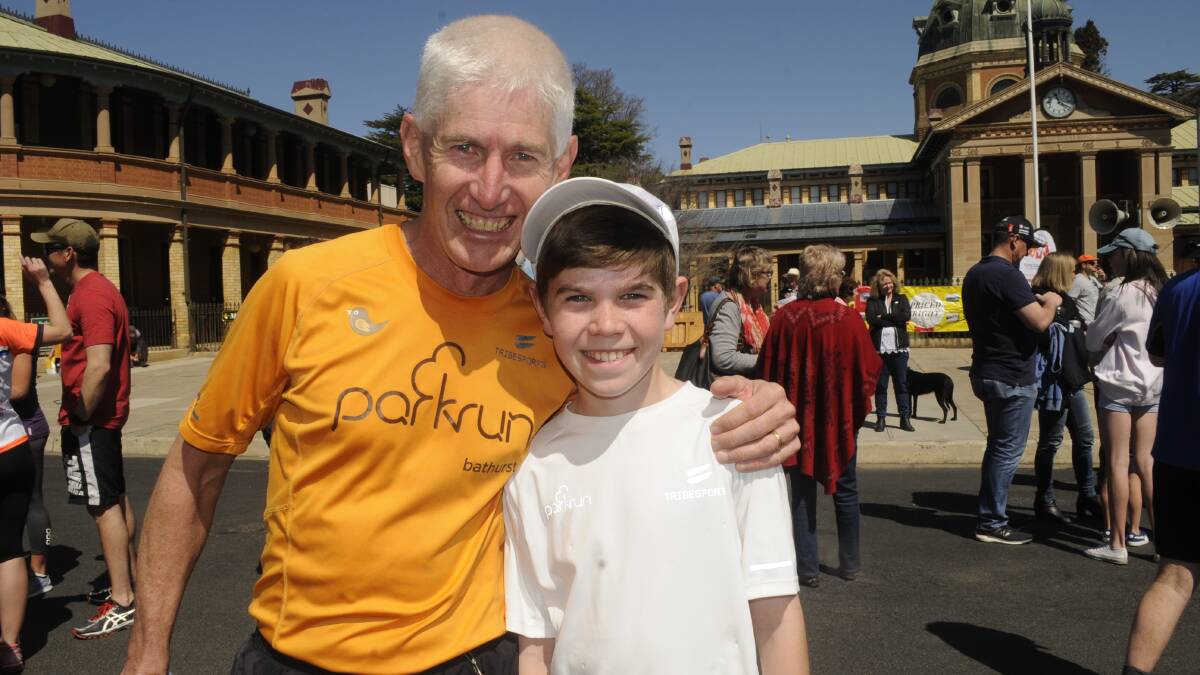 FUN DAY: Stephen Jackson (sixth runner home from Eglinton) with his son, Joshua (10), who has run the jog three times. 091717cejog14