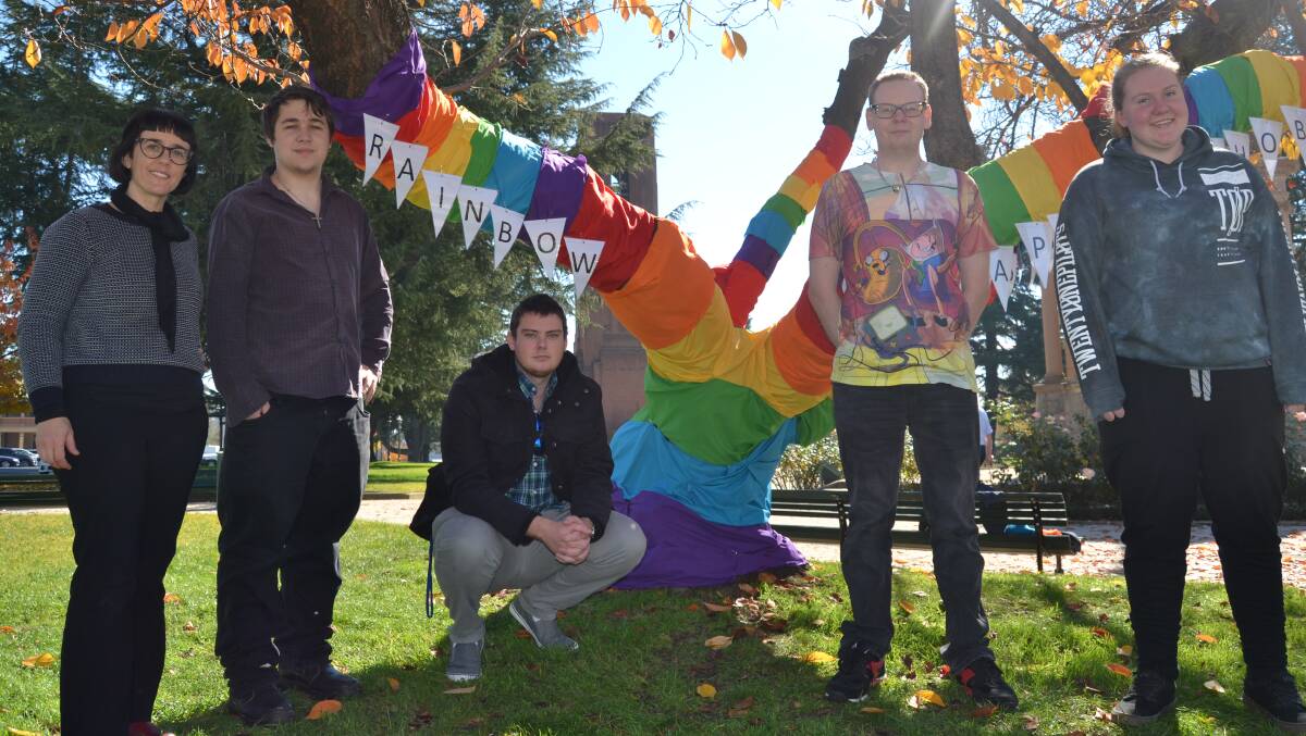 RAINBOW TREE:  Karen Golland (Youth Community Engagement Co-Ordinator), Damien Buckley, Dave Muter, Paul Rowe and Abbie Graham, at the rainbow tree in Kings Parade.