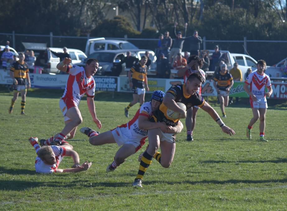 NOT ENOUGH: Oberon Tigers' Riccie Arriola dives over for his try on the stroke of half-time to bring the deficit back to 16-12 against the Mudgee Dragons on Saturday. Photo: ALEXANDER GRANT 082716agtigers