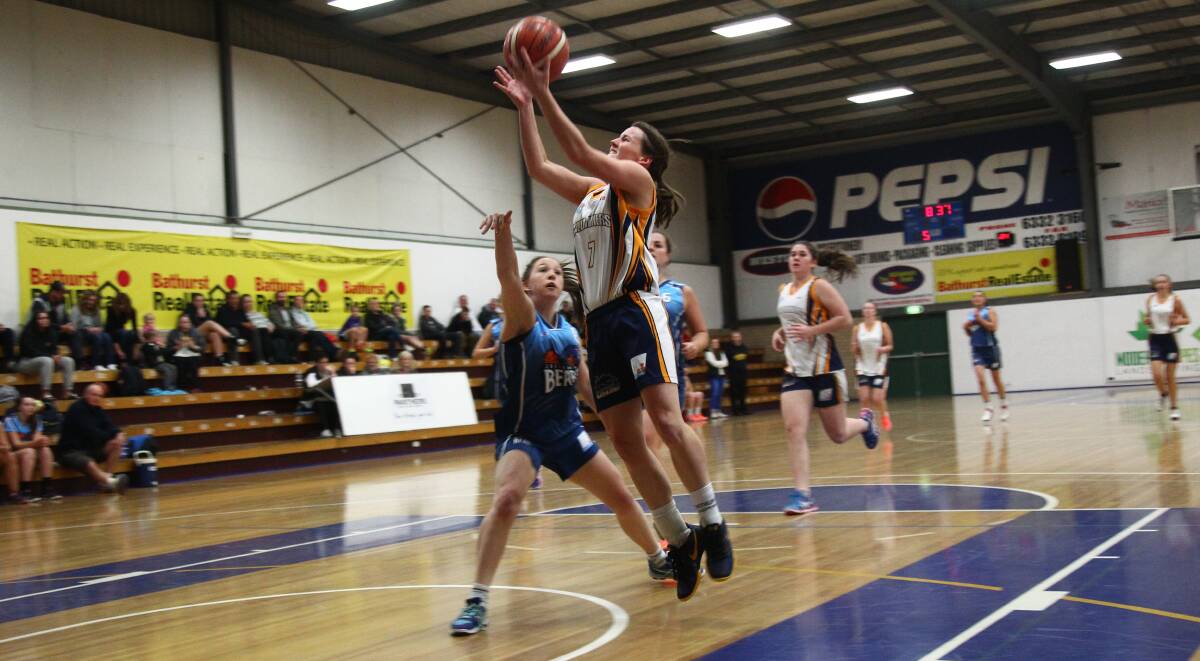 BEATING THE BEARS: Bathurst Goldminers' Bronte Emanuel goes up for a shot against the Goulburn Bears on Saturday. Photo: PHIL BLATCH
