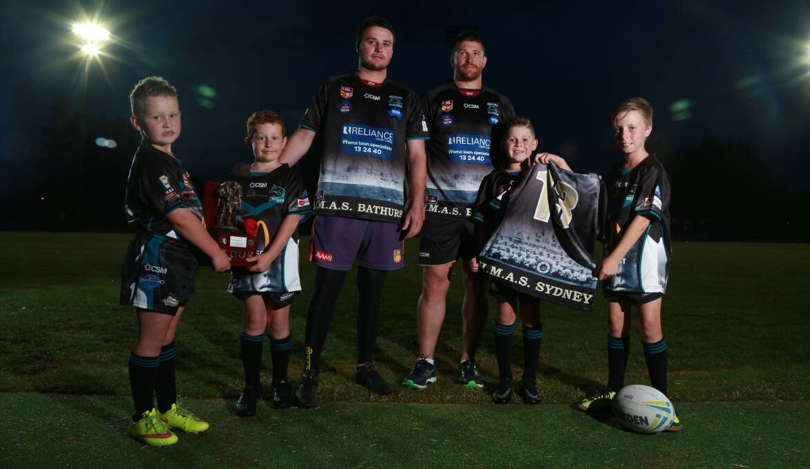 DERBY: Rory Elphick, Curtis Haigh, Jake Betts, Todd Barrow, Riley Hall and Gilby Glawson with Anzac Day trophy and shirts. Photo: PHIL BLATCH