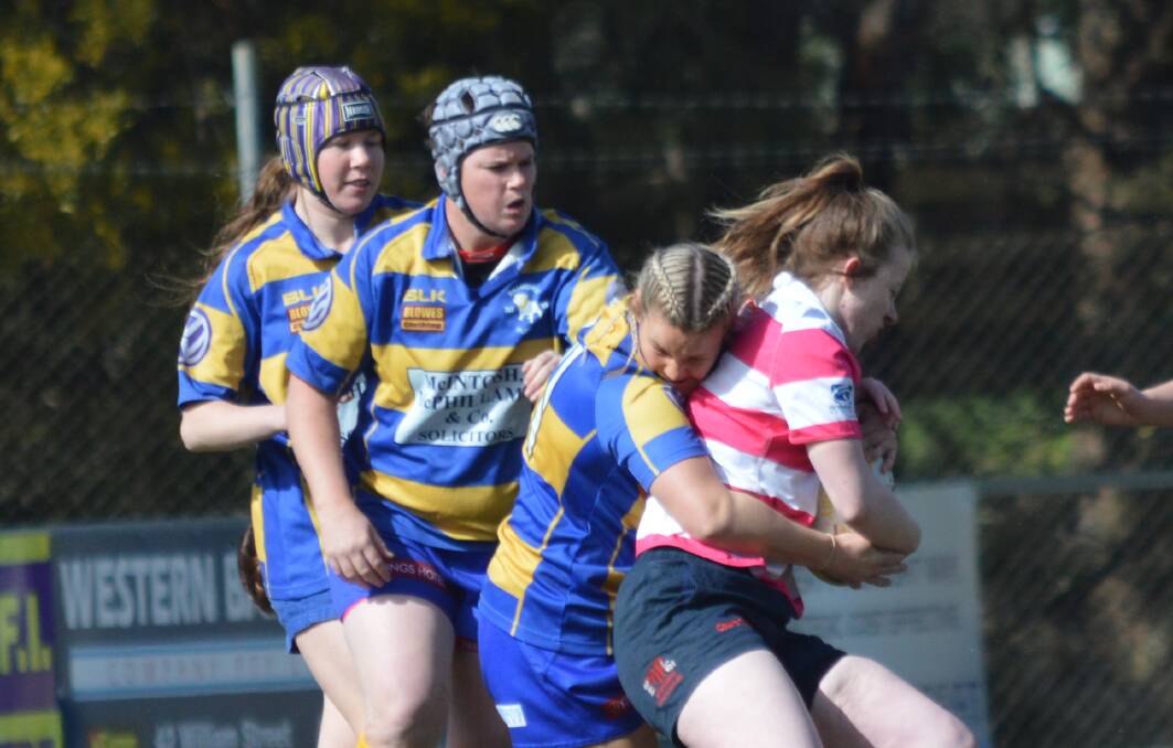 WRAP THEM UP: Bathurst Bulldogs will be aiming to contain a dangerous Cowra Eagles side in this Saturday's Central West Rugby Union women's grand final at Endeavour Oval. Photo: NICK GUTHRIE