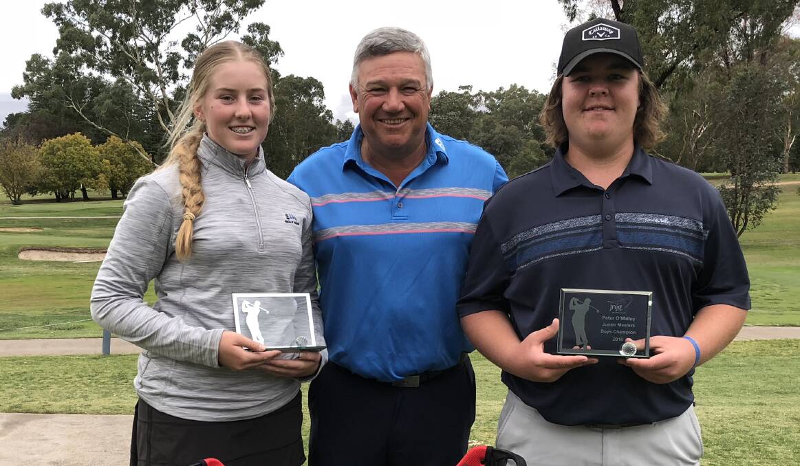 COMFORTABLE WIN: Annika Boyd and Corey Lamb were dominant winners at the Bathurst Golf Club on Sunday. They're pictured either side of the tournament's namesake, and Bathurst professional, Peter O'Malley.