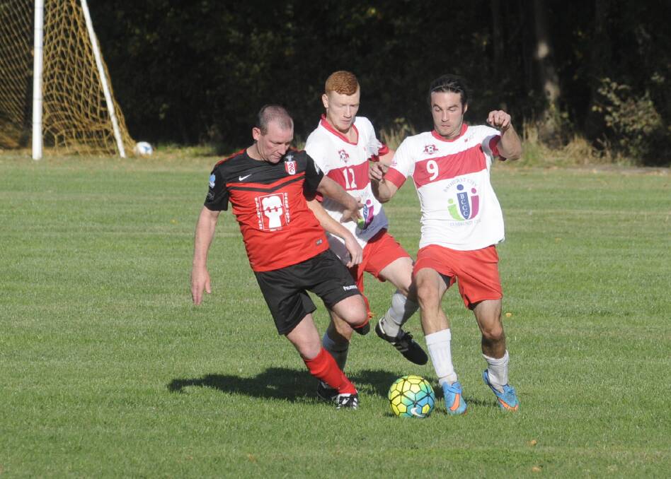 LET'S DO IT: Jimmy Shaw (right) and CSU are out to win against Lithgow Workmans on Sunday. Photo: CHRIS SEABROOK 042416csumsoc2