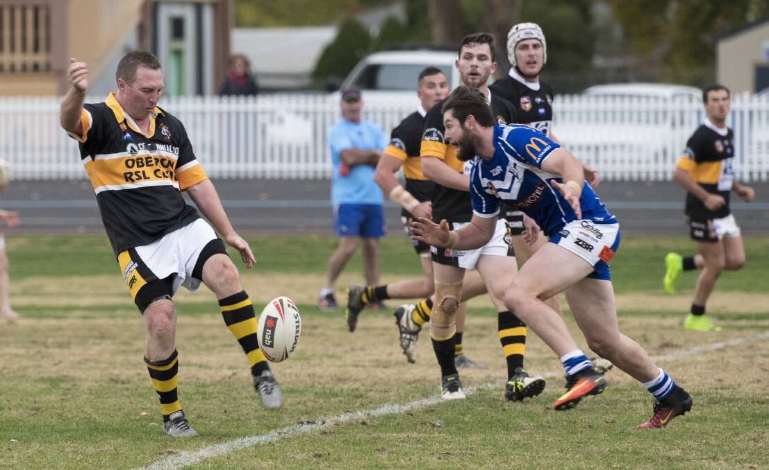LEADER: Luke Branighan sends the ball long for the Oberon Tigers. Photo: ALEXANDER GRANT