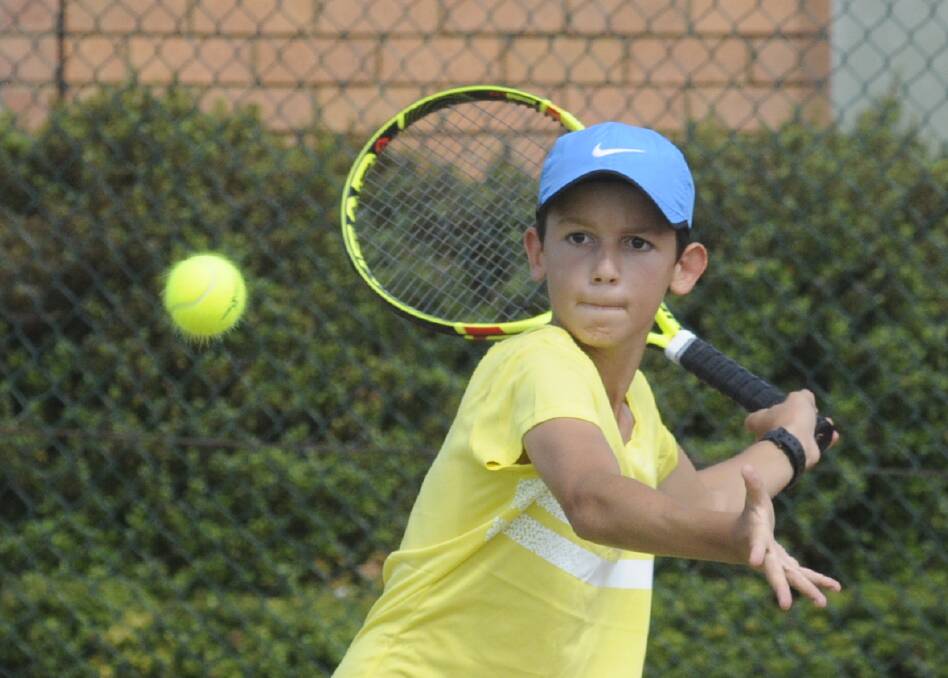 FOCUSED: Central West Cyclones player Nicholas Magnisalis has his eyes on the ball during Sunday's action. Photo: CHRIS SEABROOK  031917ctenis1
