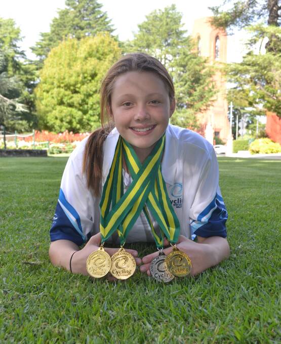 WHAT A HAUL: Tyler Puzicha with her four medals from the Junior Track Nationals, held recently at Dunc Gray Velodrome. Photo: ALEXANDER GRANT