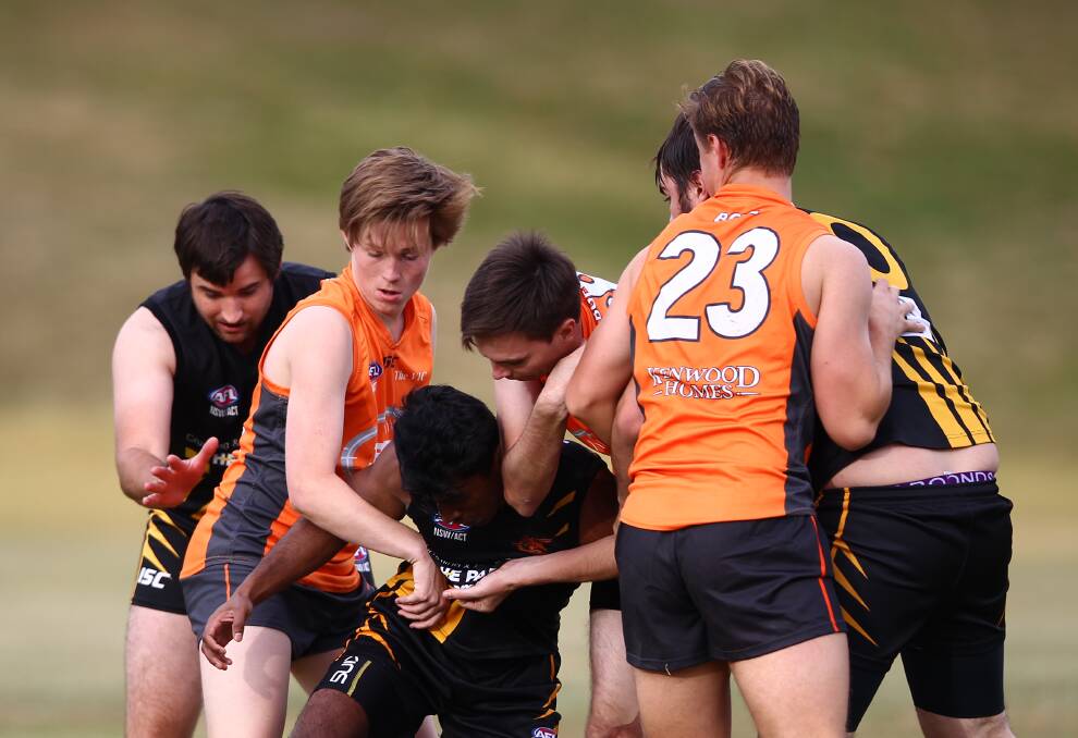 CLOSE ONE: Bathurst Giants got as close as four points to the Orange Tigers in their Central West AFL meeting before Paul Jenkins was sent off. Hosts Tigers ran away to record a 16-17-113 to 11-11-77 win. Photo: PHIL BLATCH