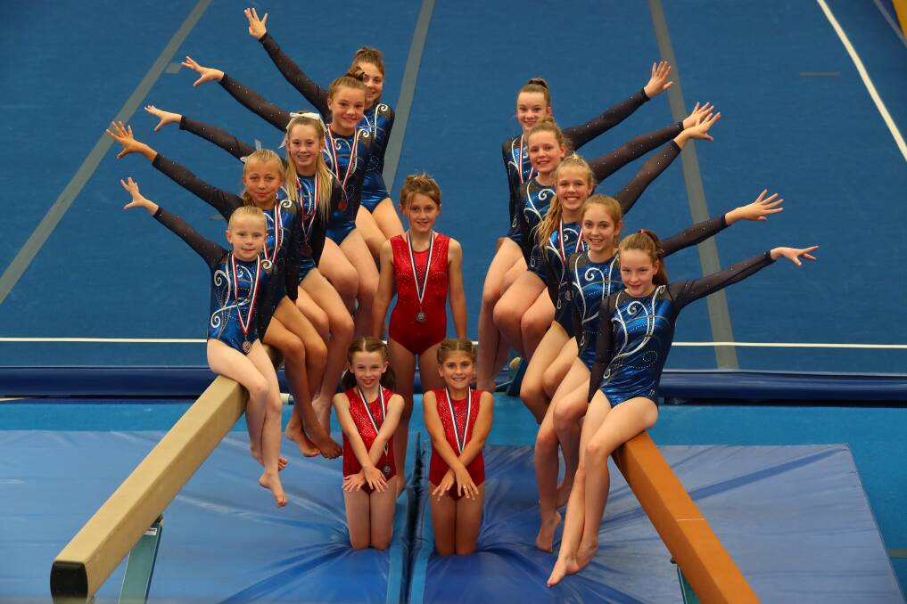 GREAT DISPLAY: Isabelle Lund, Summer Beckmann, Kelley Toole, Emma Wardle, Chelsea Bestwick, Ella Taylor, Emily Kelly, Jess McGarry, Elle Wardle, Zoe Koffmann, Olivia Clemens, Lilly Mulligan and Chloe Tayler at PCYC. Photo: PHIL BLATCH