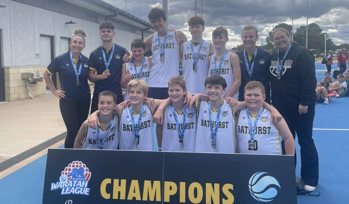 Bathurst Goldminers under 14s celebrate after their grand final win. Picture supplied.