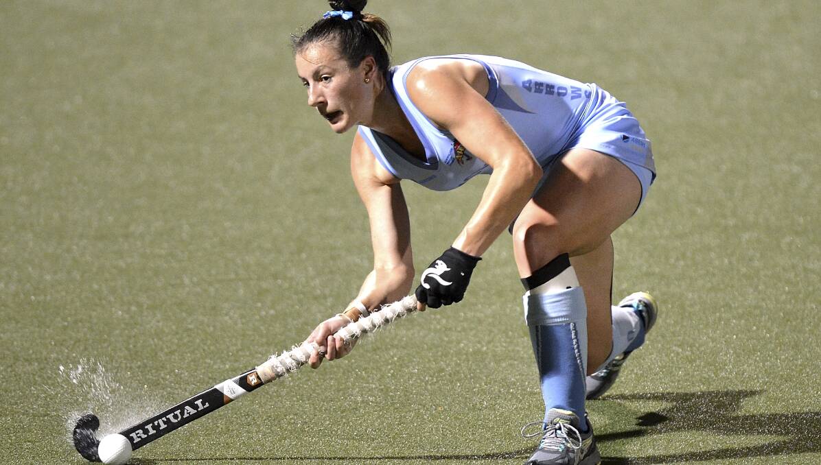 WE CAN DO IT: Bathurst's Tamsin Bunt is aiming to take her NSW Arrows back to the top of the AHL. Photo:  Photo: BRADLEY KANARIS 101514hockey2
