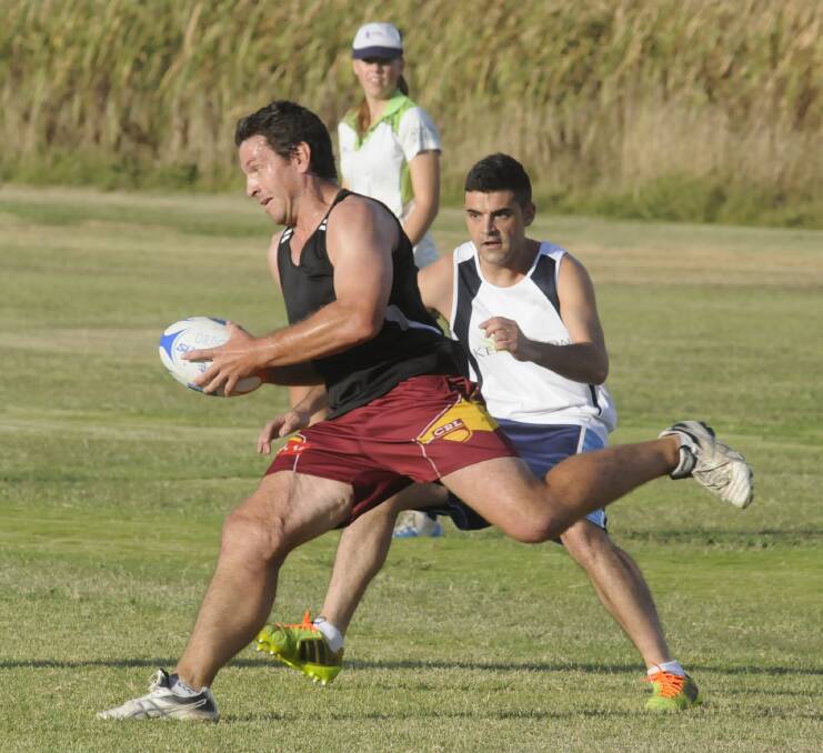 LET'S GO: Mick Armstrong in action during Bathurst Touch Football's A grade men's grand final last season. Photo: CHRIS SEABROOK