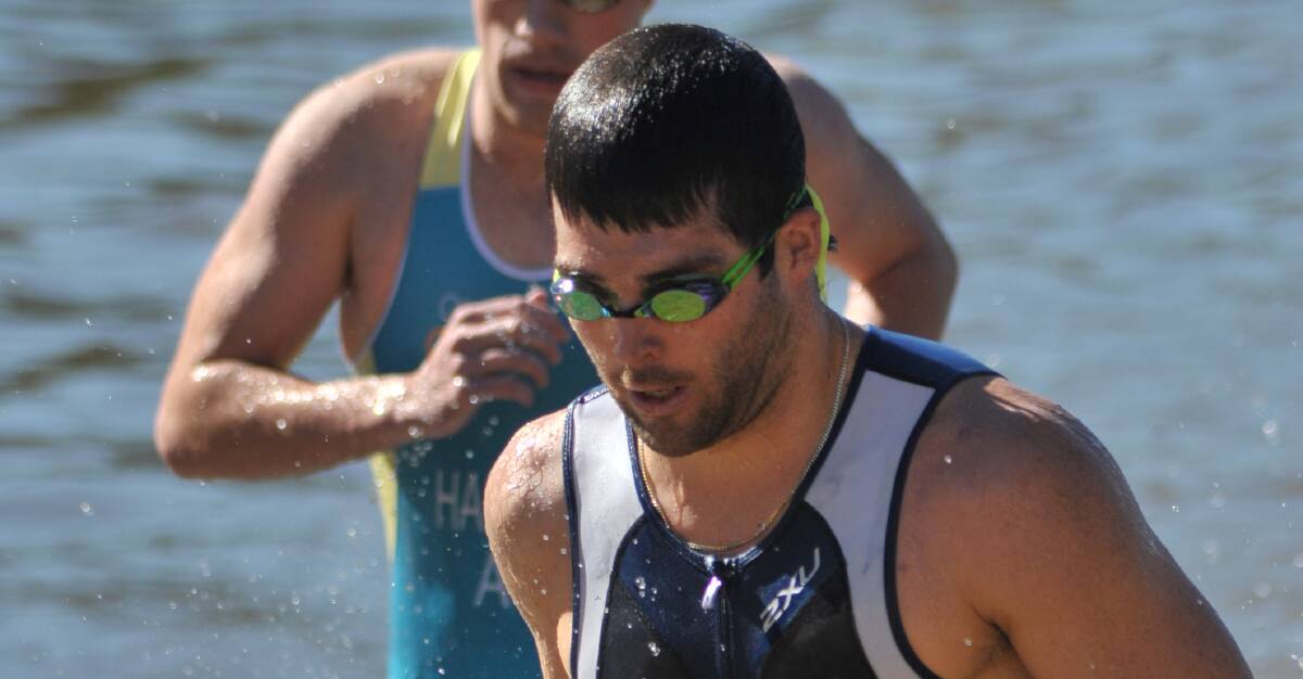 SUPER RESULT: Nick North finished eighth overall at the Huskisson Long Course triathlon on Sunday. The Bathurst competitor also finished first in the 25-29 years age group. Photo: JUDE KEOGH 0306tri15