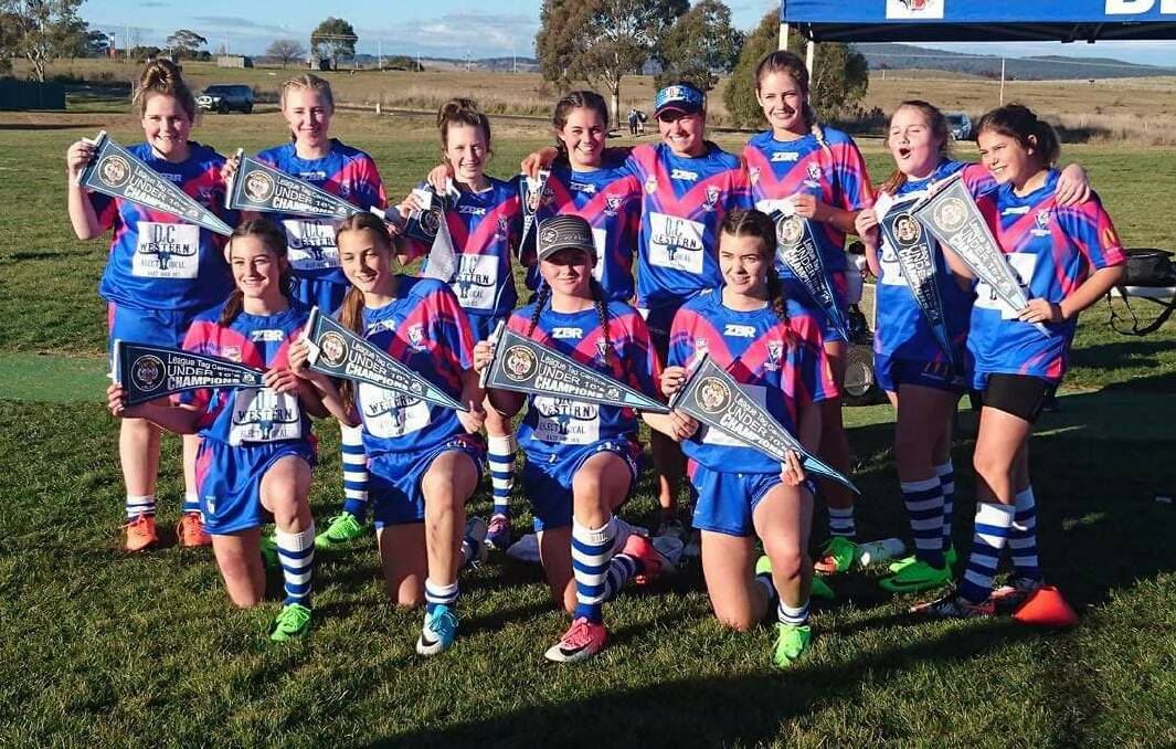 PLENTY TO SMILE ABOUT: The St Pat's under 16s girls league tag side celebrate after their undefeated run at the Orange gala day on Sunday.