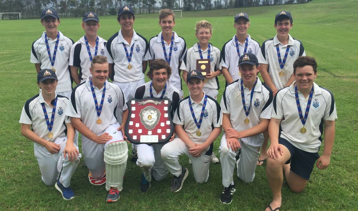 IT'S OURS: The victorious Saint Stanislaus' College players hold the Berg Shield following their victory over Saint John's College. Photo: CONTRIBUTED