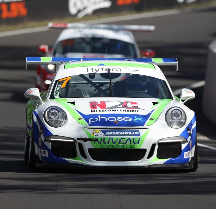 RACING AWAY: Matt Campbell extended his Carrera Cup championship lead thanks to his opening race win on Friday ahead of David Wall and Steven Richards. Photo: PHIL BLATCH G83G9338