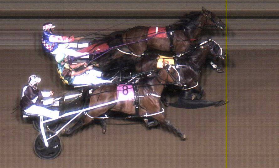 NOTHING IN IT: Bernie Hewitt's Royal Story (top of picture) finished second to Our Triple Play in this photo finish.
