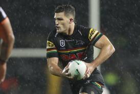 Nathan Cleary takes the ball forward during the Penrith Panthers' game against the Wests Tigers at Carrington Park in 2023. Picture by Phil Blatch.
