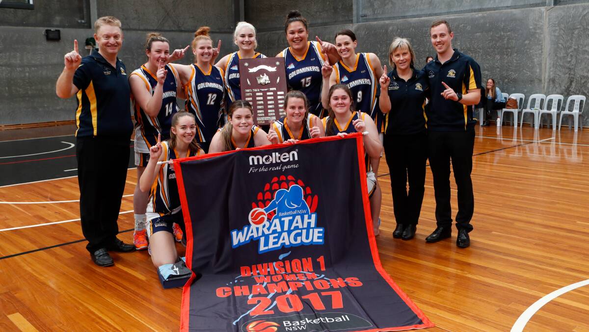 WE DID IT: The Bathurst Goldminers celebrate their division one women's State League triumph. Photo: CHRIS LANE PHOTOGRAPHY
