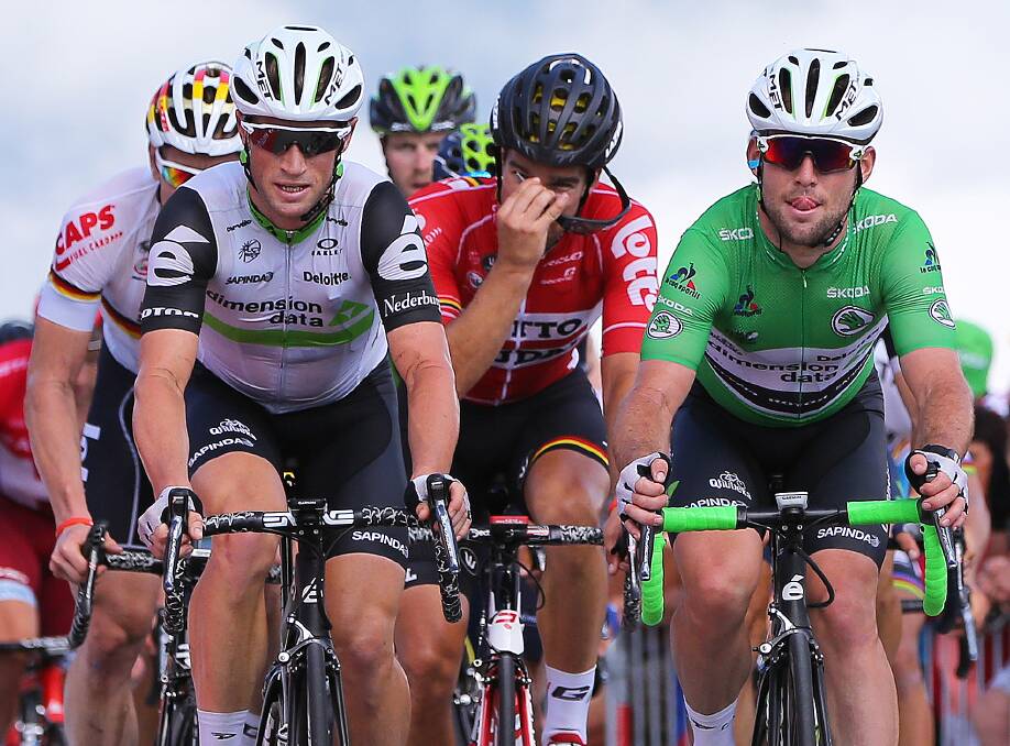TEAM TRIUMPH: Bathurst's Mark Renshaw (left) rides alongside team mate Mark Cavendish during stage seven of the Tour de France. Photos: GETTY IMAGES 071016renshaw
