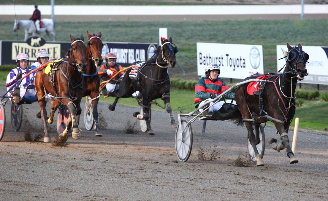 CATCH YOU LATER: Kylie Barnes drives Swaggie Shannon away from the rest of the field in Wednesday night's Hynash Constructions Pace (1,730 metres) at Bathurst Paceway. Photo: PHIL BLATCH