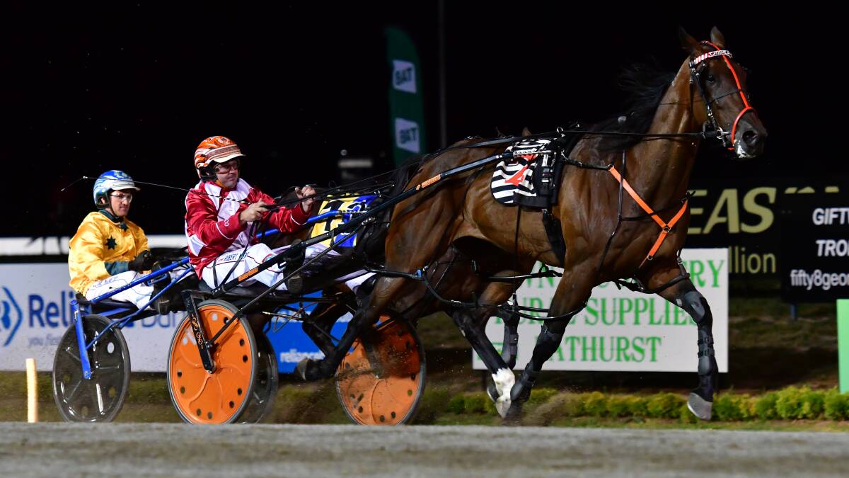 WHAT A RUN: Charlaval runs down raging favourite Bling It On in Tuesday night's Shirley Turnbull Memorial. Photo: ALEXANDER GRANT