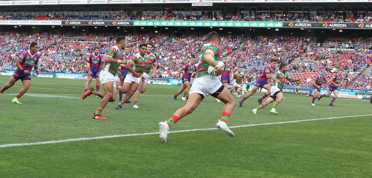 MOMENT TO TREASURE: Stannies product Braidon Burns runs around on his way to scoring his first try in the NRL. Photo: GETTY IMAGES