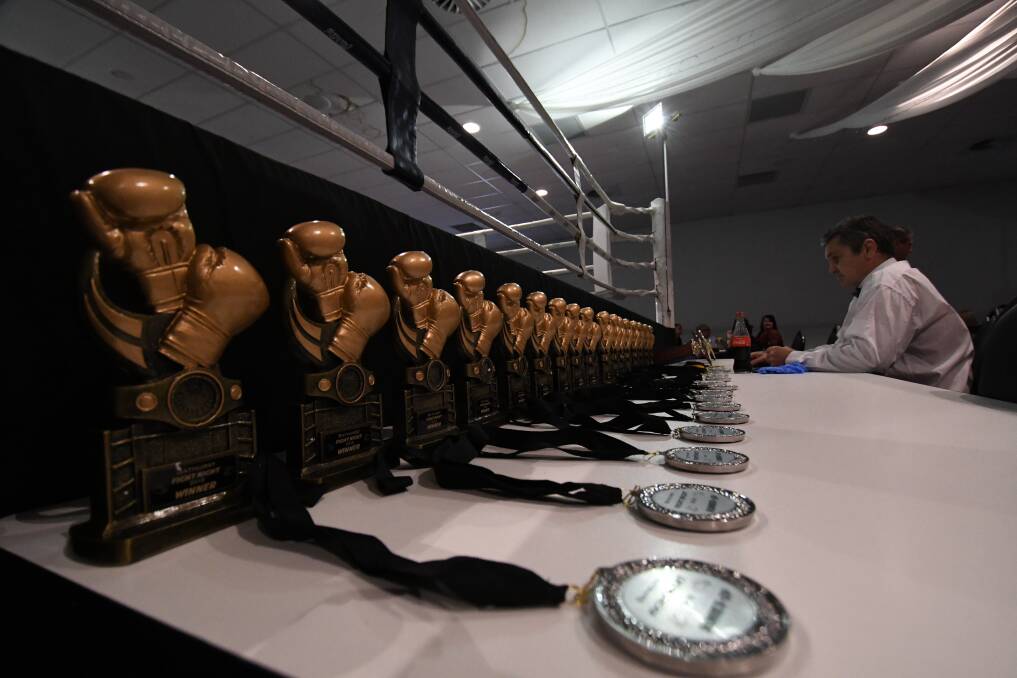SNAPSHOT: All the trophies and medals were seen lined up at the recent Bathurst Fight Night. Photo:CHRIS SEABROOK  121518cboxng4a