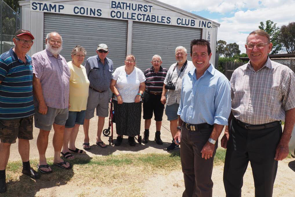 SUCCESS: State member Paul Toole with club vice president Jack Smith (front) and members of the Bathurst Stamp, Coins, Collectables and Lapidary Club. Photo: SUPPLIED