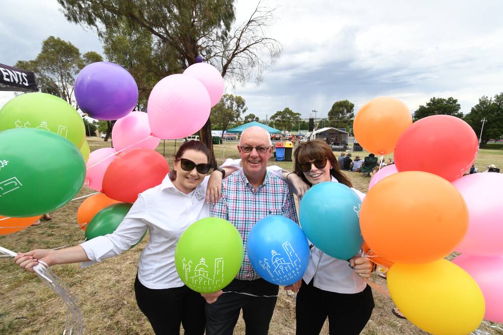 PARTY TIME: Mayor Graeme Hanger with Tamara Wootton and Bree McManus from Bathurst Regional Council's events team. Photo: CHRIS SEABROOK 