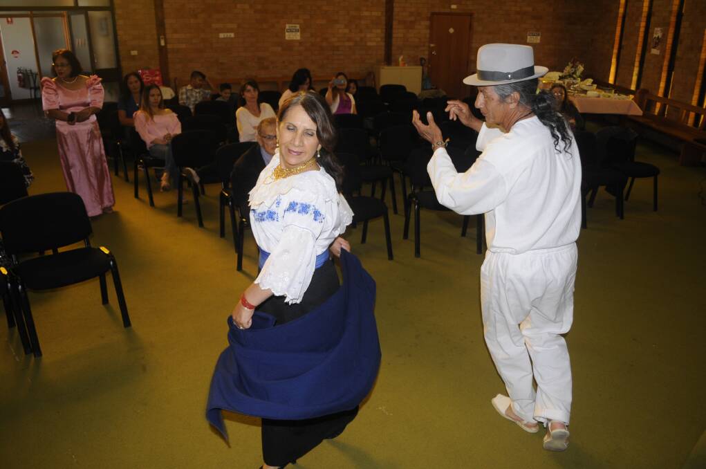 SNAPSHOT: Marcela and Edwardo Paez performed a cultural dance at a recent Filipiniana Friends Group event. Photo: CHRIS SEABROOK 101417cfilo5a