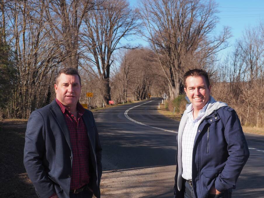 SPEED CHANGE: Councillor Warren Aubin and member for Bathurst Paul Toole beside Vale Road, where the speed limits have changed. Photo: SUPPLIED