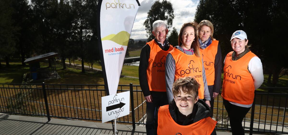COME FOR A RUN: Join Stephen Jackson, Bronwyn Starkey, Jennifer Arnold, Amanda Fell and Jake Arnold (front) at the first parkrun event on Saturday. Photo: PHIL BLATCH 071316pbpark4