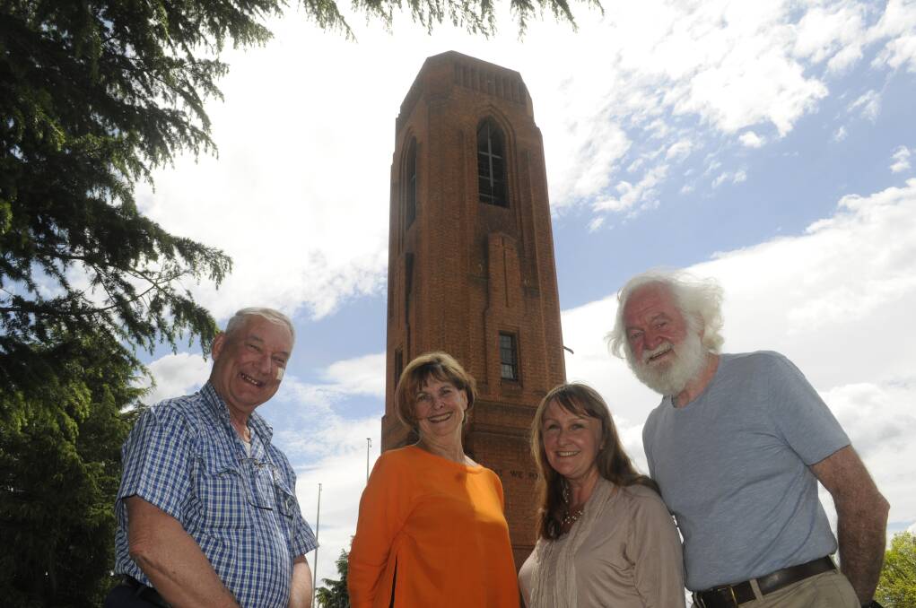 VISITORS: Bathurst carillonist Ian Bates with visiting carillon experts Lyn Fuller, Jess Rowan and Terry McGee at the Bathurst War Memorial Carillon on October 25. Photo: CHRIS SEABROOK 102517carilon1