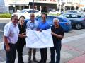 Peter Rogers, business owners Karla McDiarmid and Matt Clifton, mayor Jess Jennings and Graeme Burke standing in Howick Street with drawings for parking. Picture by Rachel Chamberlain