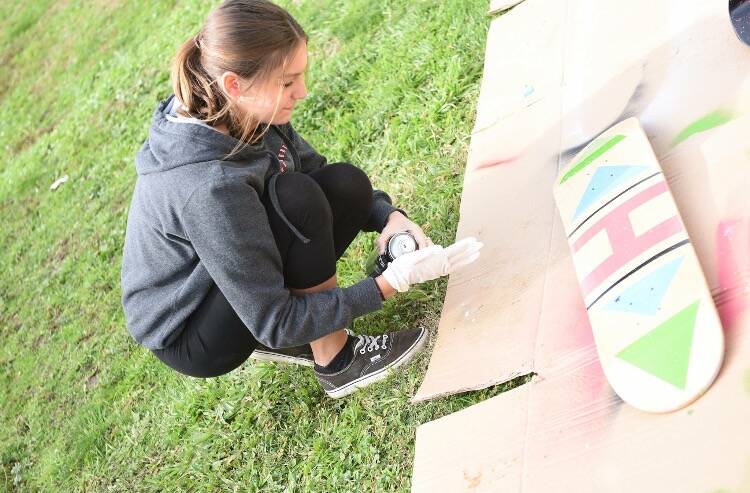 GETTING CREATIVE: Children can come up with their own designs for skateboard decks at a Bathurst PCYC workshop on Friday morning. Photo: SUPPLIED  