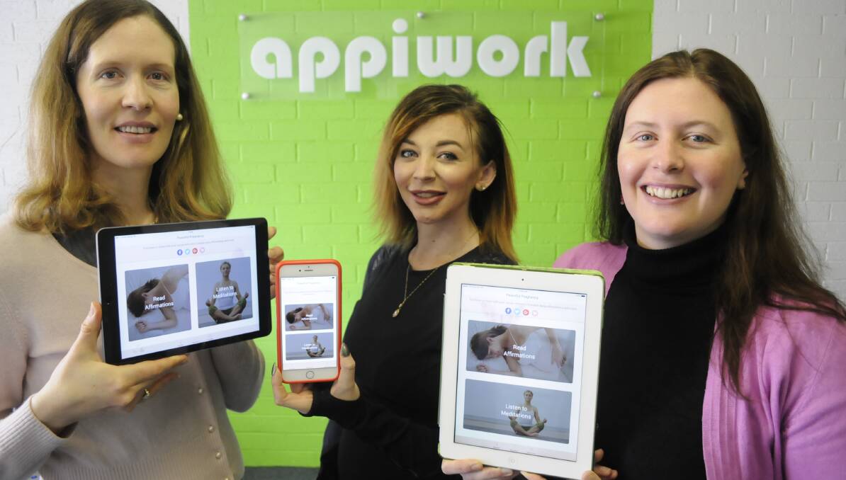 NEW APP: Bella Townsend, expectant mother Amy Gleeson and Appiwork business development manager Zoe Hida. Photo: CHRIS SEABROOK 092016cappiwrk1