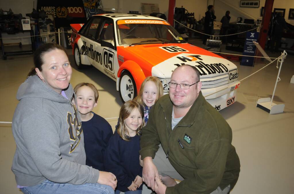 EVENT WITH POTENTIAL: Linda and Troy, from Laylor Park in Sydney's west, visited the National Motor Racing their kids Cian (7), Natalia (5) and Amelia (7) on Father's Day. The event is likely to return next year. Photo: CHRIS SEABROOK 090416cmuseum7
