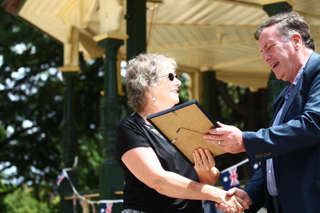 HONOUR: Bathurst Child and Family Network chair Annette Meyers collected the award for Community Event of the Year from Peter Cosgrove after BCFN's Family Fun Day was named the winner last year. Photo: PHIL BLATCH