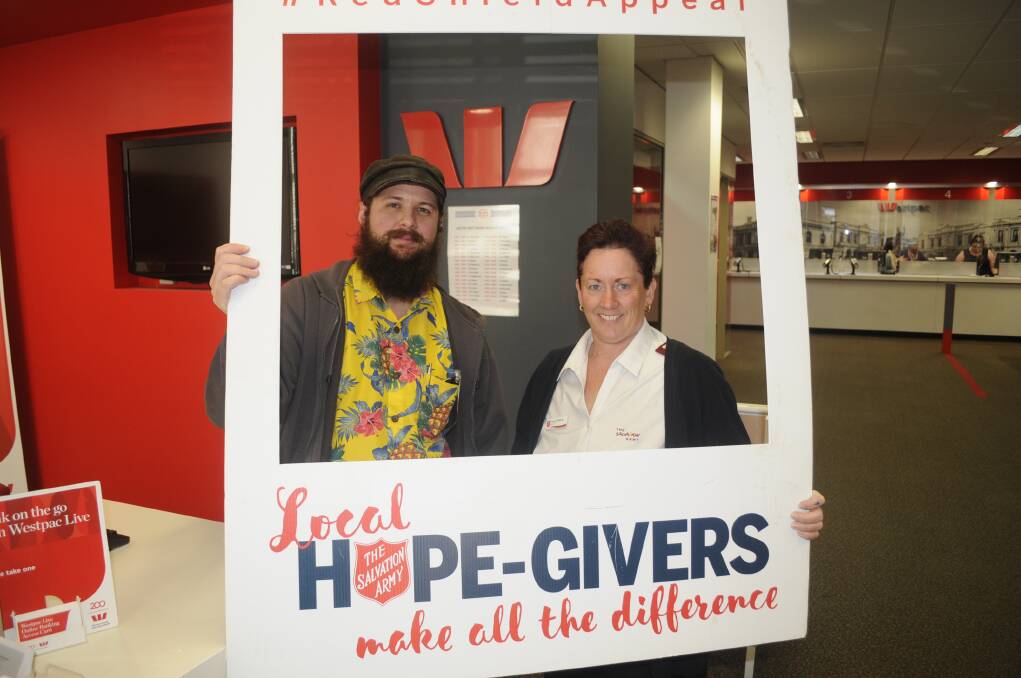 HOPE: Red Shield Appeal volunteer Harold Chamberlain and Salvation Army lieutenant Penny Williams want to raise more in 2018. 052817csalvos